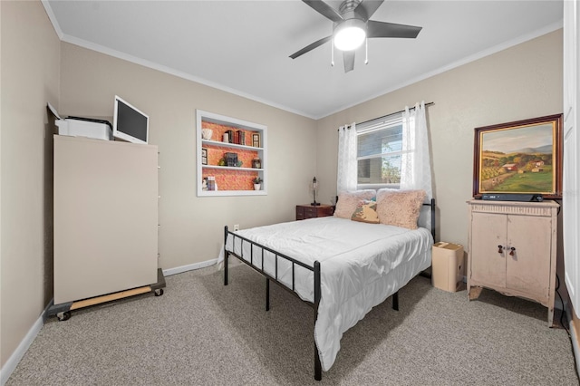 bedroom with ceiling fan, carpet, and ornamental molding