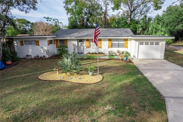 ranch-style house with a front lawn and a garage