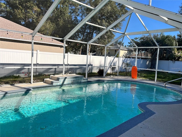 view of pool with a lanai