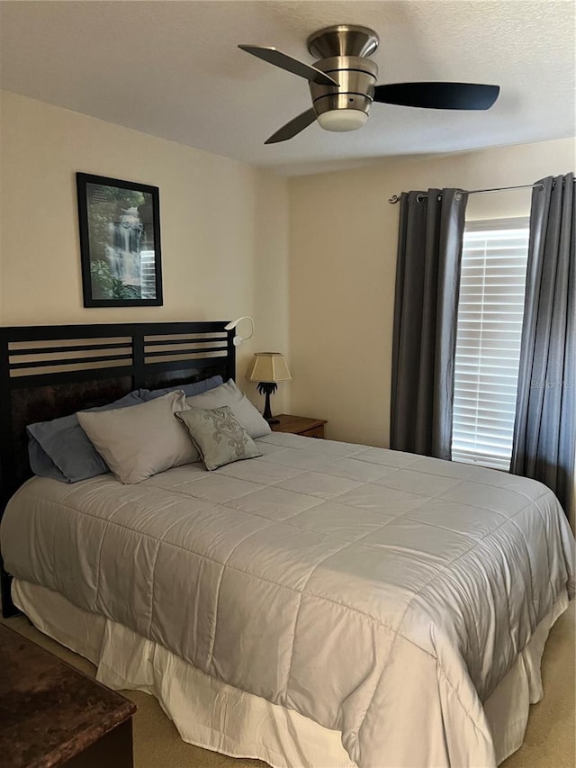 bedroom with carpet floors and ceiling fan