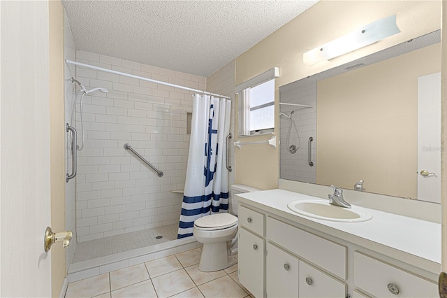 bathroom featuring toilet, vanity, tile patterned floors, a shower with curtain, and a textured ceiling