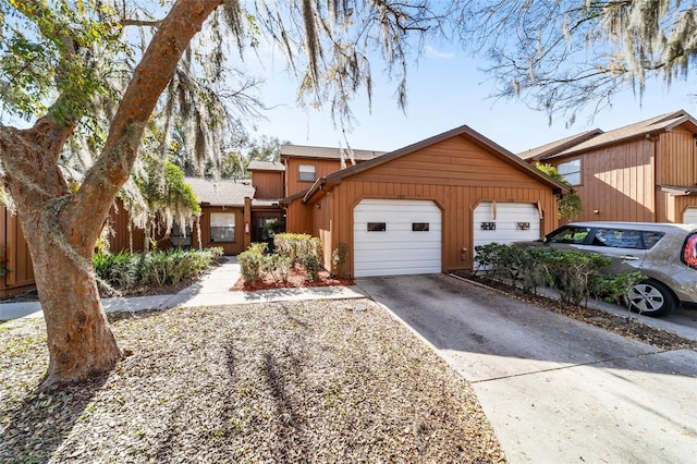 multi unit property featuring a garage