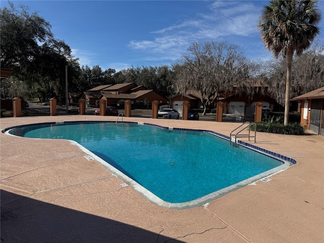 view of pool featuring a patio area