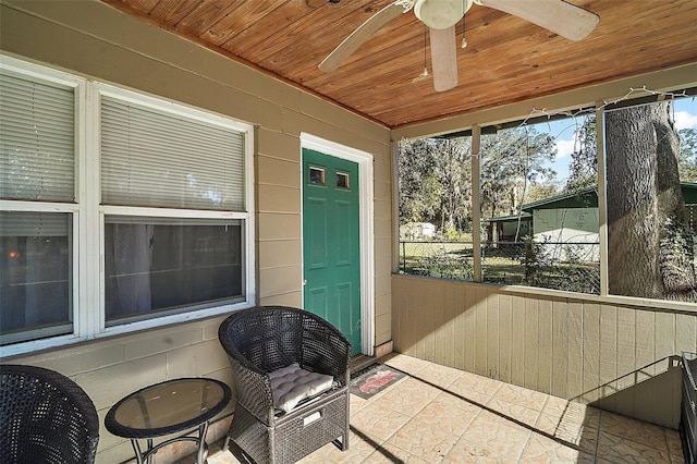 view of patio featuring ceiling fan