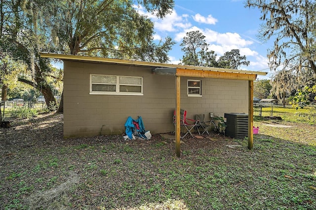 view of outbuilding with central air condition unit