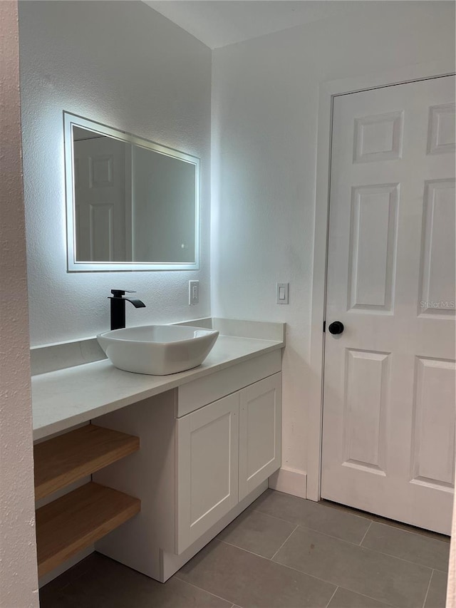 bathroom featuring vanity and tile patterned floors