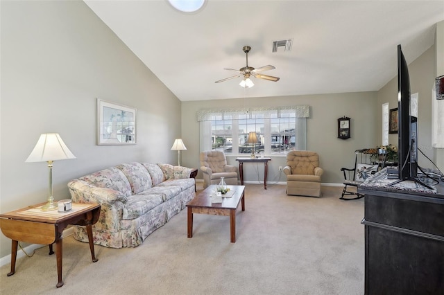 living area with visible vents, baseboards, light colored carpet, vaulted ceiling, and a ceiling fan