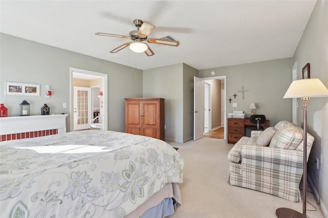 bedroom with baseboards, light carpet, and a ceiling fan