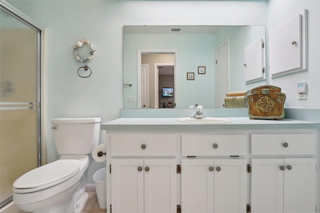 bathroom with visible vents, a shower stall, toilet, and vanity