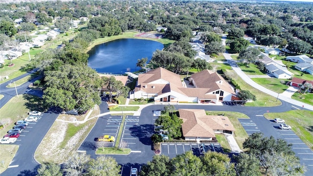 birds eye view of property featuring a residential view and a water view