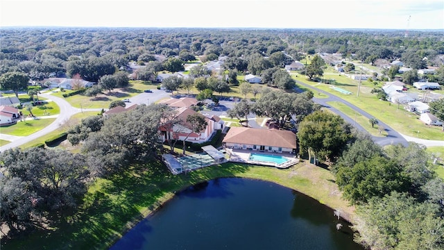 birds eye view of property featuring a water view and a residential view