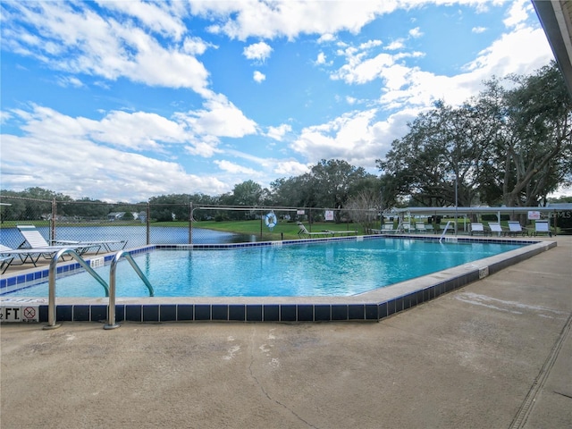 community pool featuring fence