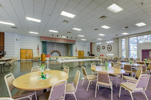 dining room with visible vents and a drop ceiling