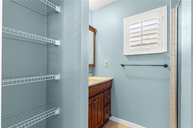 bathroom featuring vanity and tile patterned floors