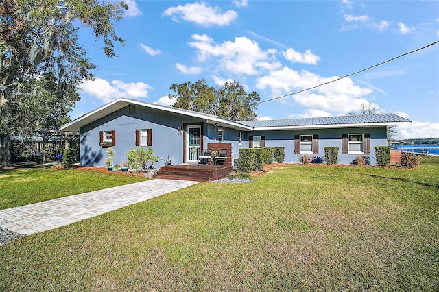 single story home with a front yard