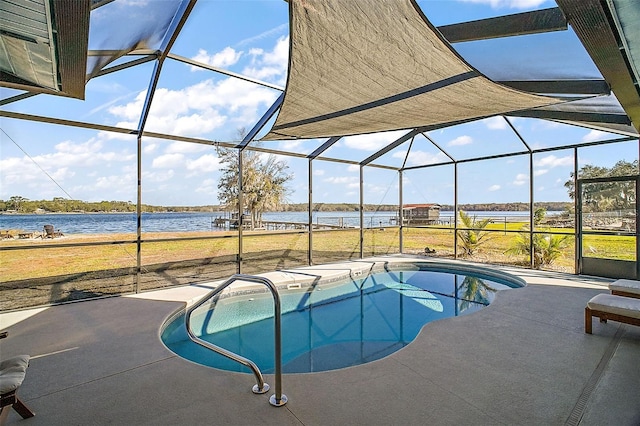 view of pool featuring a lanai, a water view, and a patio