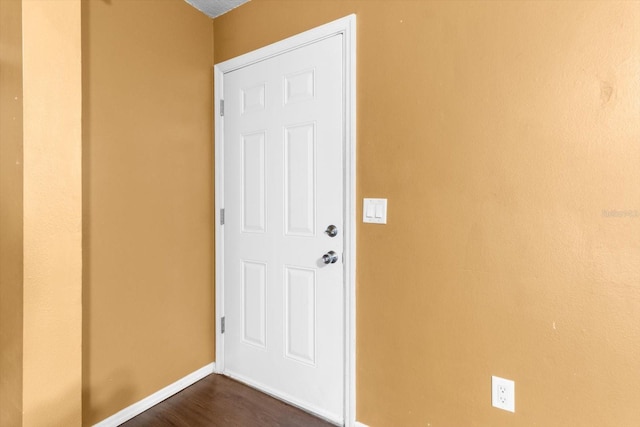 entryway with light hardwood / wood-style floors