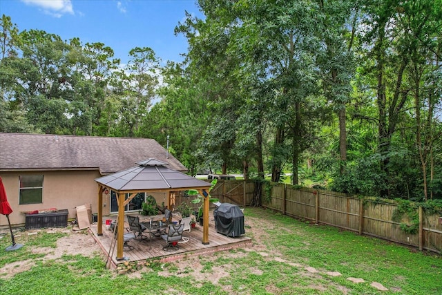 view of yard featuring a gazebo and a deck