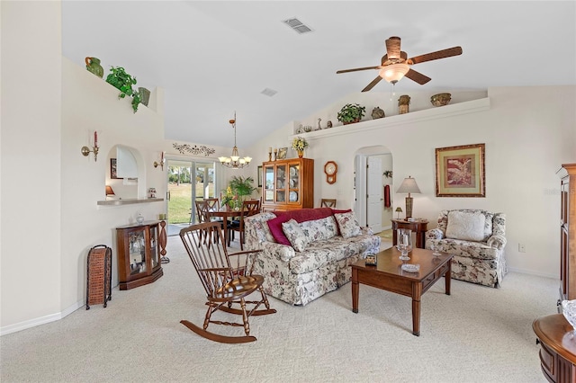 living room featuring light colored carpet, high vaulted ceiling, and ceiling fan with notable chandelier