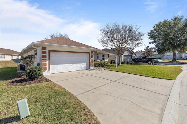 single story home with a garage, a front yard, and central air condition unit