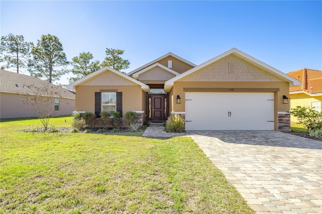 craftsman inspired home with a front yard and a garage