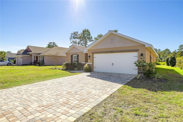 single story home with a garage and a front lawn