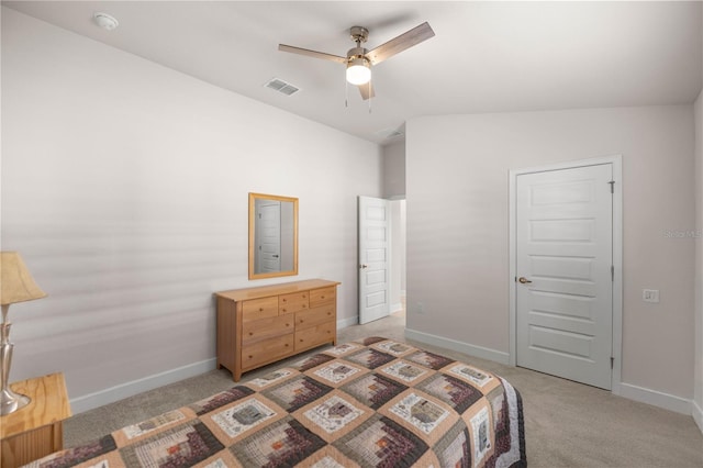 bedroom with light carpet, ceiling fan, and vaulted ceiling