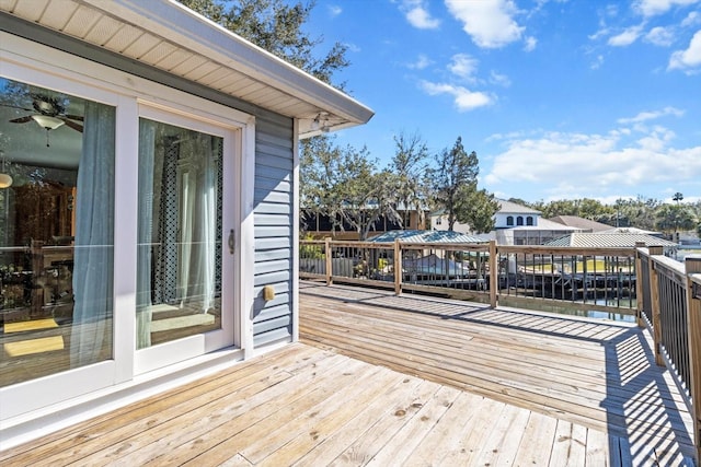 wooden terrace with a water view