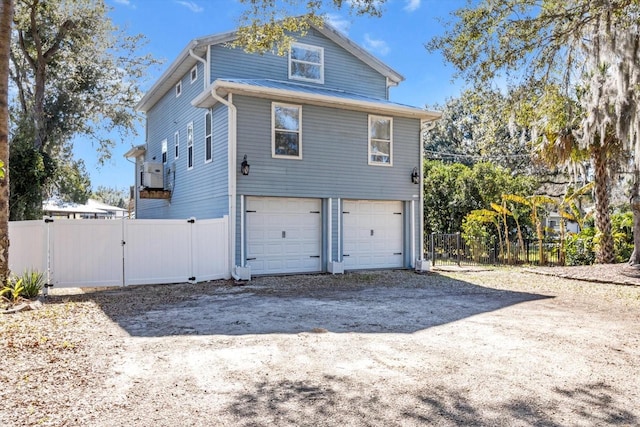 view of home's exterior with a garage