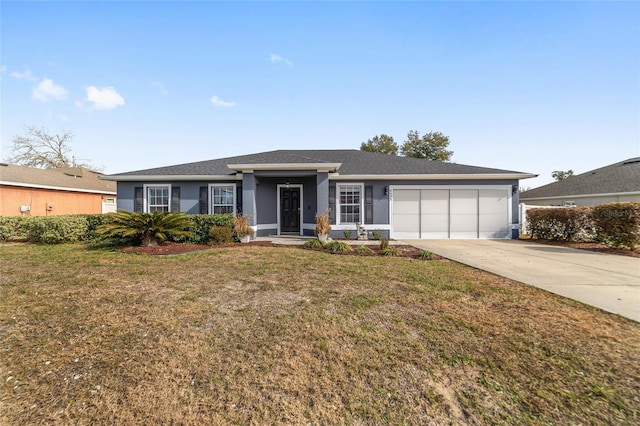 single story home with a garage and a front yard