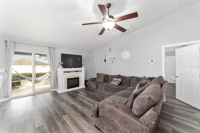 living room with ceiling fan and hardwood / wood-style floors