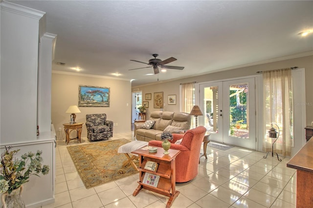 tiled living room featuring ceiling fan, crown molding, and french doors