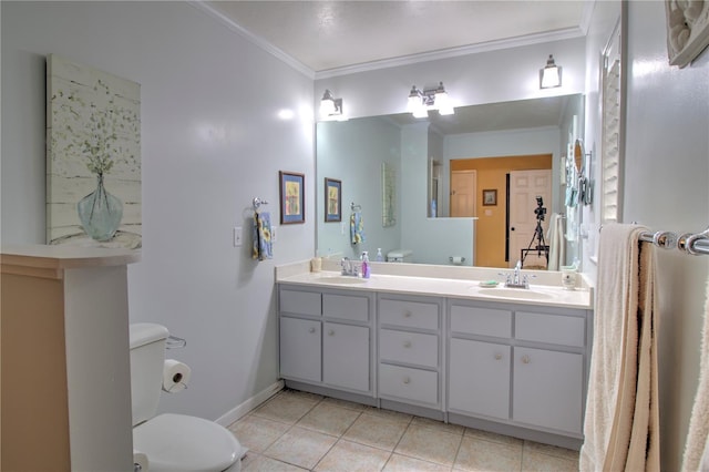 bathroom featuring toilet, vanity, tile patterned floors, and ornamental molding