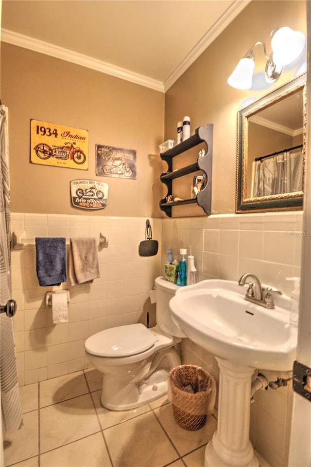 bathroom featuring ornamental molding, toilet, tile walls, and tile patterned flooring