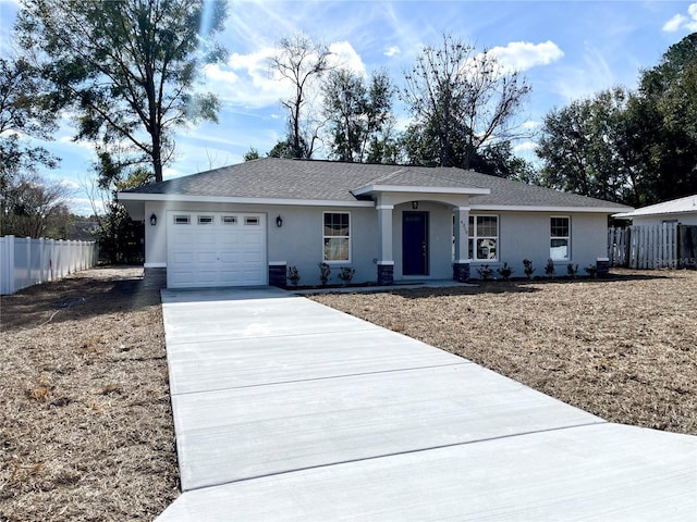 single story home with a garage