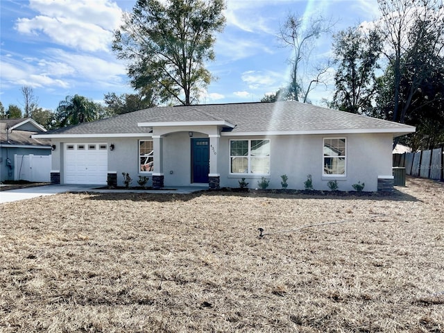 single story home featuring a garage