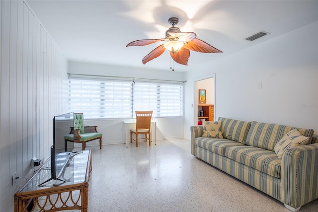 living room with ceiling fan