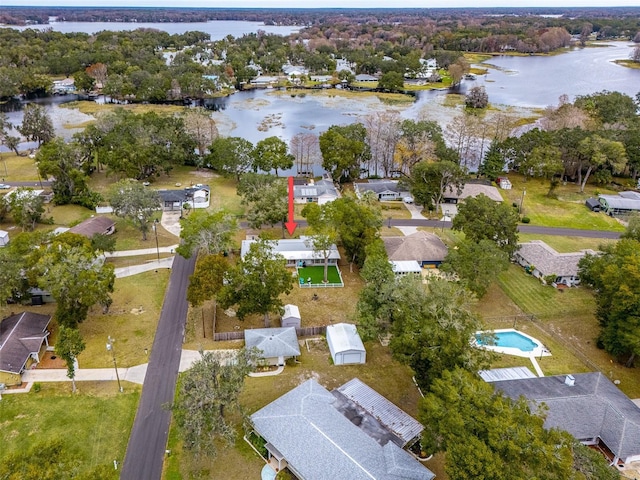 bird's eye view with a water view