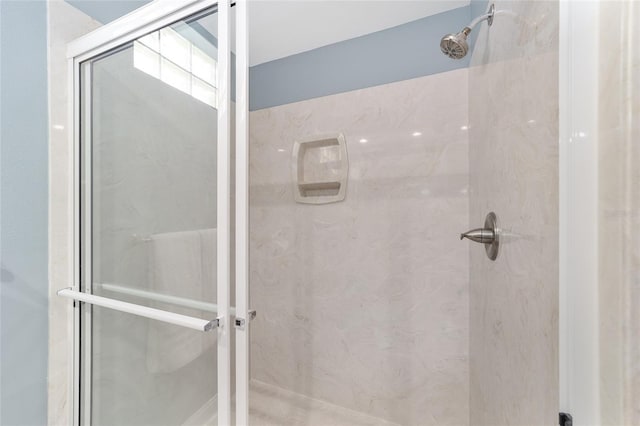 bathroom with an enclosed shower