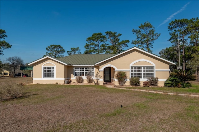 ranch-style home featuring a front yard