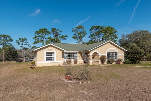 ranch-style house with a front yard