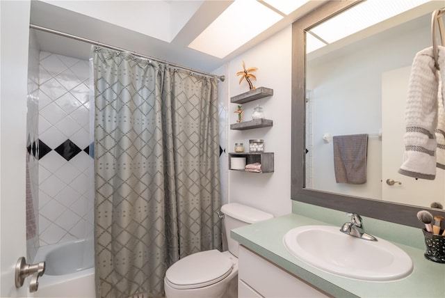 full bathroom featuring vanity, a skylight, toilet, and shower / bath combo