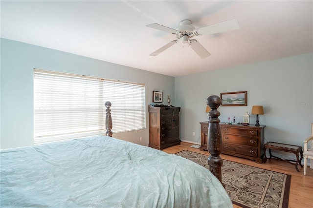 bedroom featuring ceiling fan and light hardwood / wood-style flooring