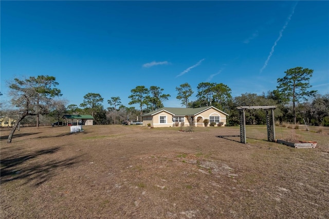 exterior space with a front lawn