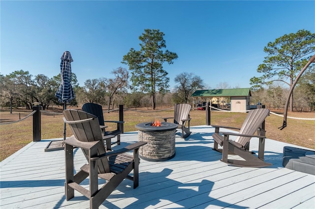 deck featuring a fire pit