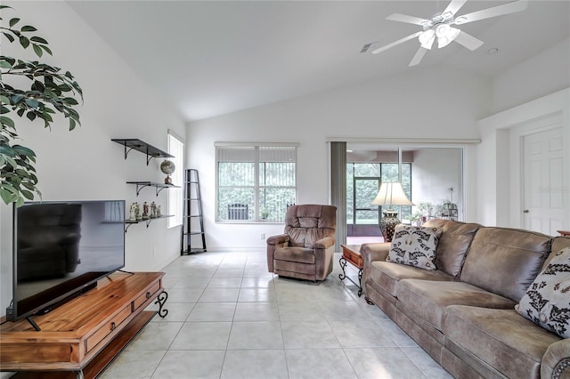 tiled living room featuring vaulted ceiling and ceiling fan