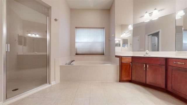 bathroom featuring separate shower and tub, tile patterned flooring, and vanity