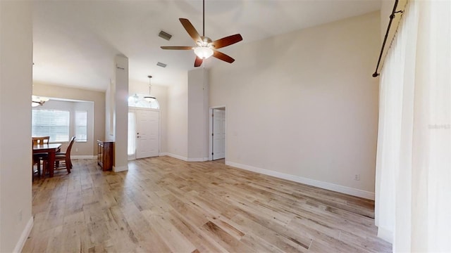 foyer entrance featuring light wood-type flooring and ceiling fan