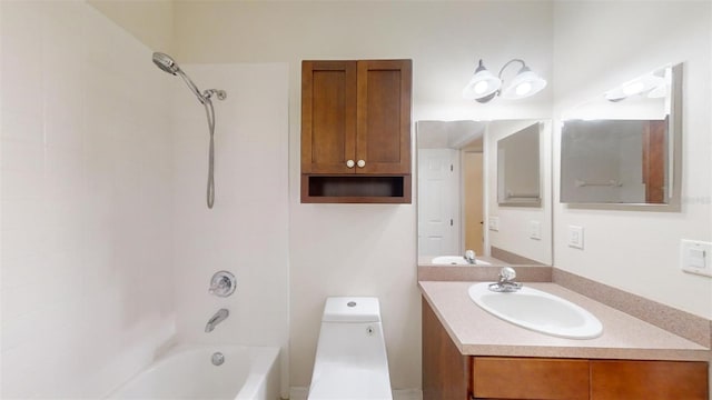 full bathroom featuring toilet, vanity, and bathing tub / shower combination