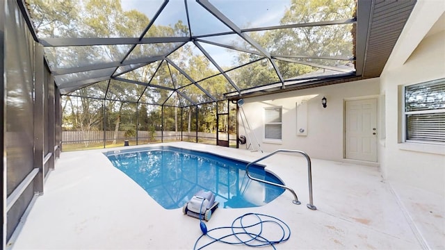 view of pool featuring a patio area and a lanai